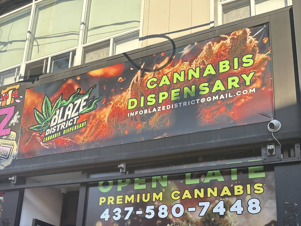 Storefront and outdoor signage of Blaze District on Kensington Avenue