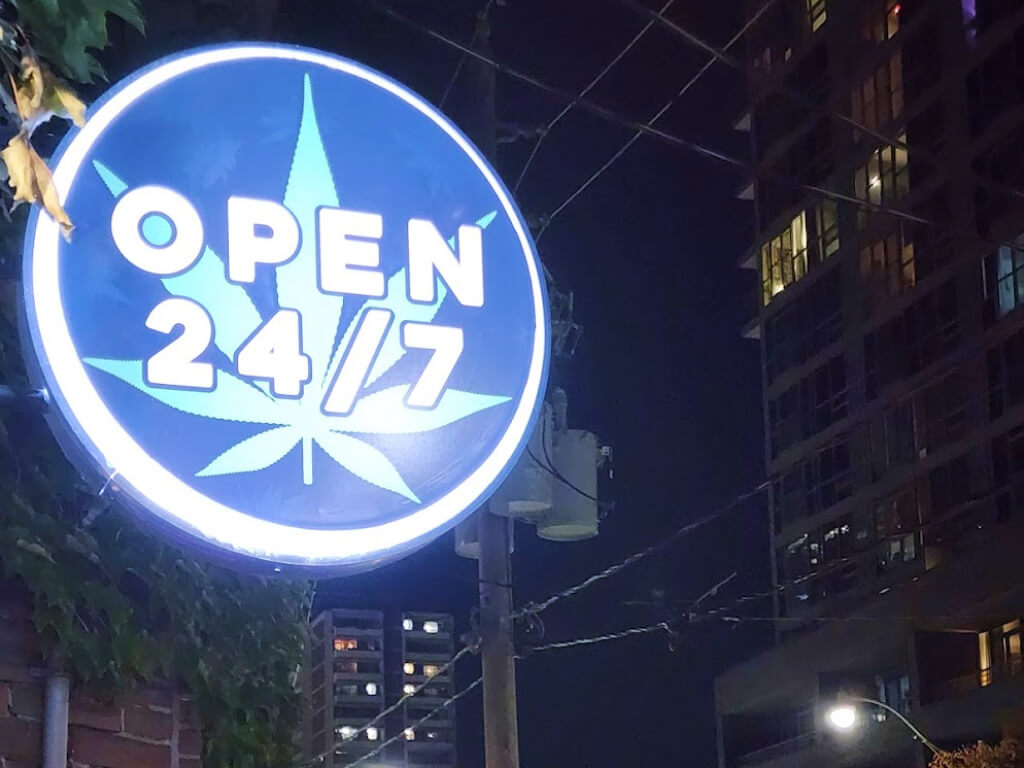 Blaze District cannabis store on Sherbourne St, sign on the street